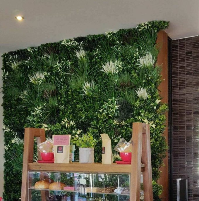 retail shop with tropical fern vertical garden panel