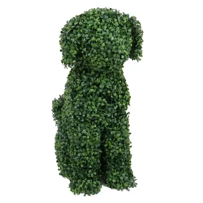 Topiary art featuring a green foliage dog sculpture. This beautifully crafted topiary dog stands tall with intricate leaf details, perfect for garden decor.