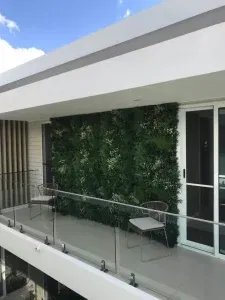 Realistic Looking Luxury Green Wall Panel in a BalconyTEST