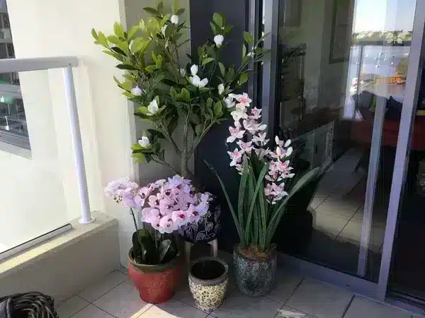 outdoor pots with faux flowers
