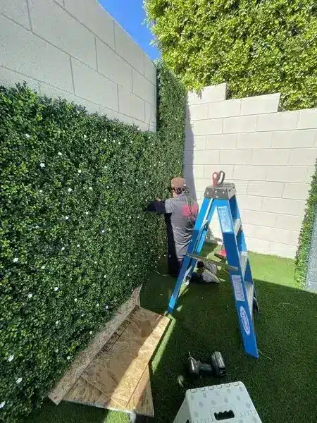 installing faux living wall outside