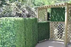 Boxwood hedges and boxwood panels cover up fence holes and gaps, adding instant privacyTEST