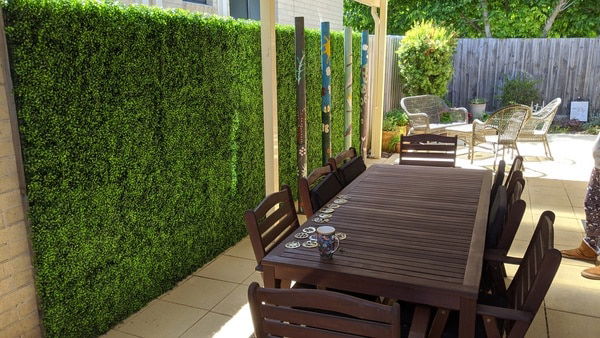 faux plant wall on a patio