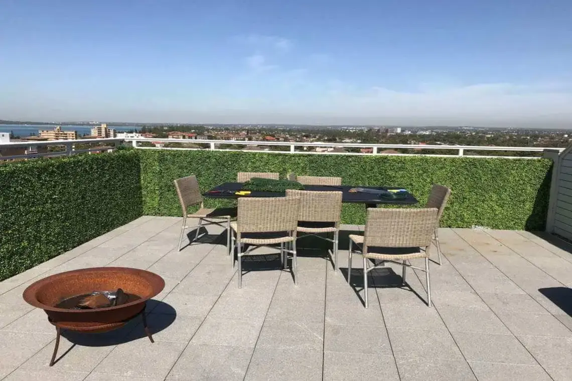 artificial hedges on balcony for privacy